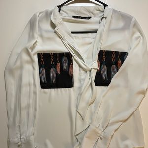 White blouse with printed pockets